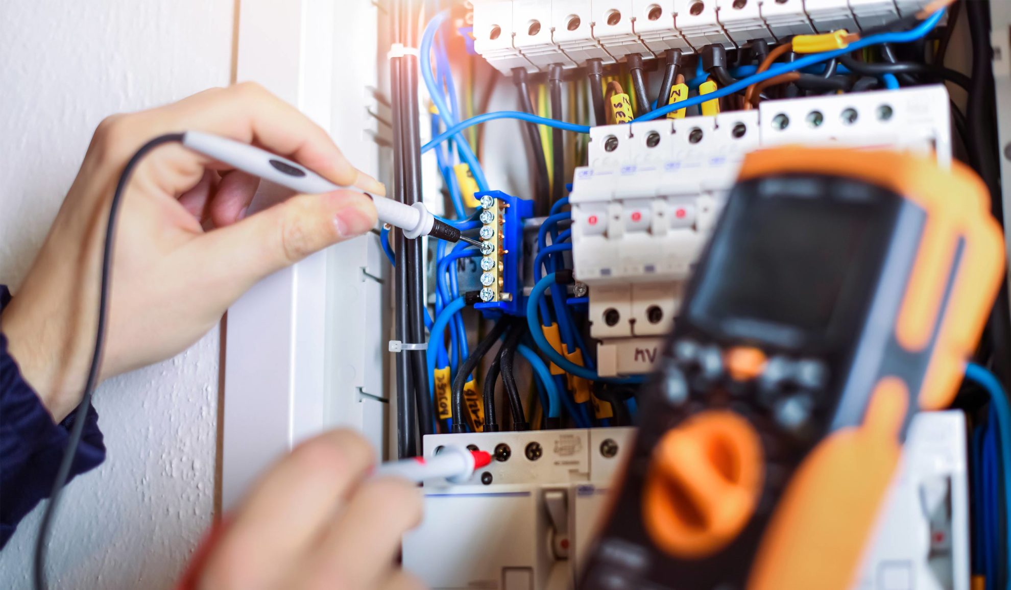 electrician-hands-with-tools-close-up-repairing-electrical-panel-auburn-ca