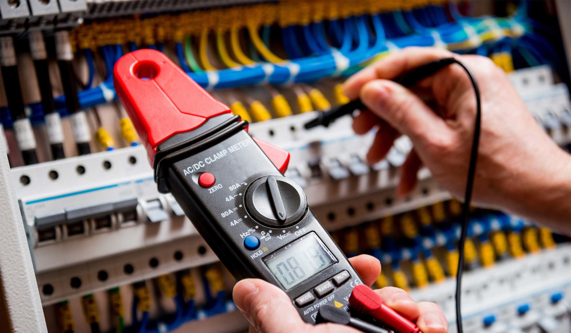 electrician-with-voltage-meter-close-up-repairing-electrical-panel-auburn-ca